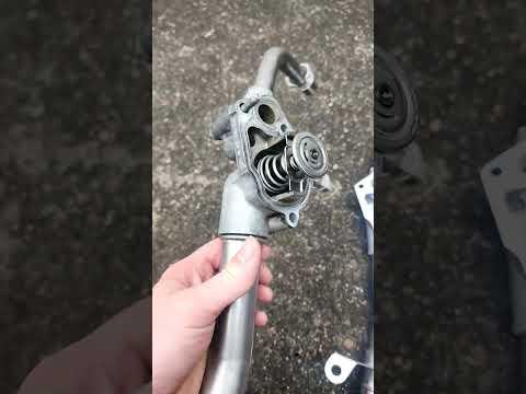 2016 chevy traverse thermostat replacement and housing