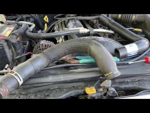 Fixing the broken Jeep! How to change radiator hose on a Jeep Grand Cherokee!