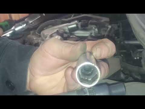 Spark plug replacement 2013 Toyota Camry 2.5L. Remove and replace plugs.
